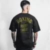 camiseta de color negro camiseta de color negro con diseño boxin blood sweat oversize trasera